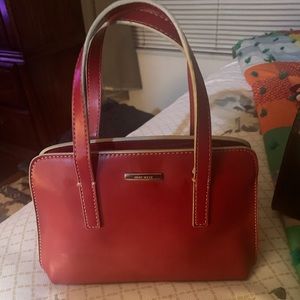 A small red handbag.